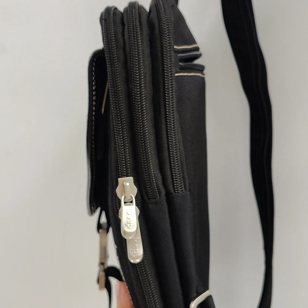 JEEP black multi section crossbody backpack bag multi use adjustable strap